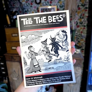 May include: A magazine titled "TELL THE BEES" with a black and white illustration of witches and demons. The subtitle reads "A catalogue of bizarre tales from Folklore, Fiction and History." Issue 10 Witchcraft is featured.