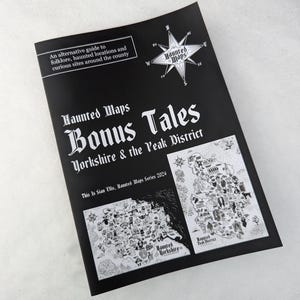 May include: A black and white booklet titled "Haunted Maps Bonus Tales Yorkshire & the Peak District". The cover features a compass rose with the words "Haunted Maps" and two maps of Yorkshire and the Peak District.