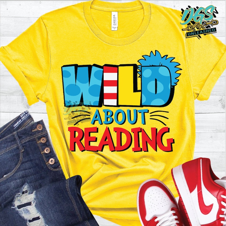 May include: Yellow t-shirt with the text "WILD ABOUT READING" in colorful, playful letters. The letters are decorated with red, white, and blue stripes and blue polka dots.