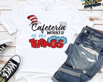 May include: White t-shirt with a red and white hat and the text "Cafeteria Worker of all Things" in red and blue letters.