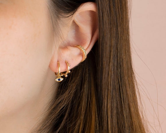 Sapphire hoops gold Tiny hoop earrings Huggie earrings Dainty earrings Minimalist earrings Eye charm gold hoops Cz evil eye earrings
