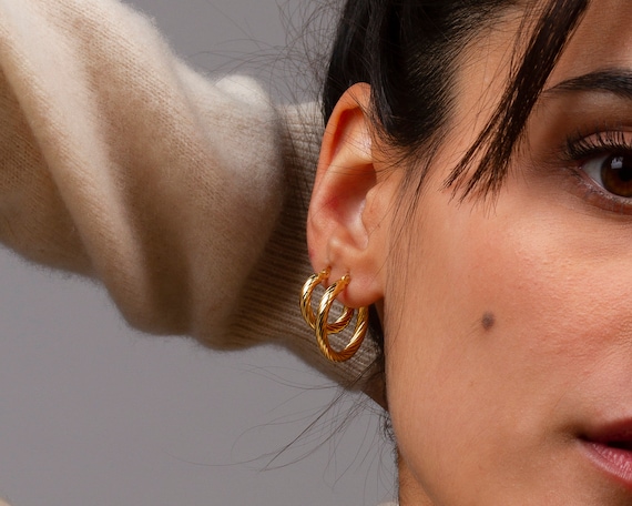 Twisted gold hoop earrings large deals