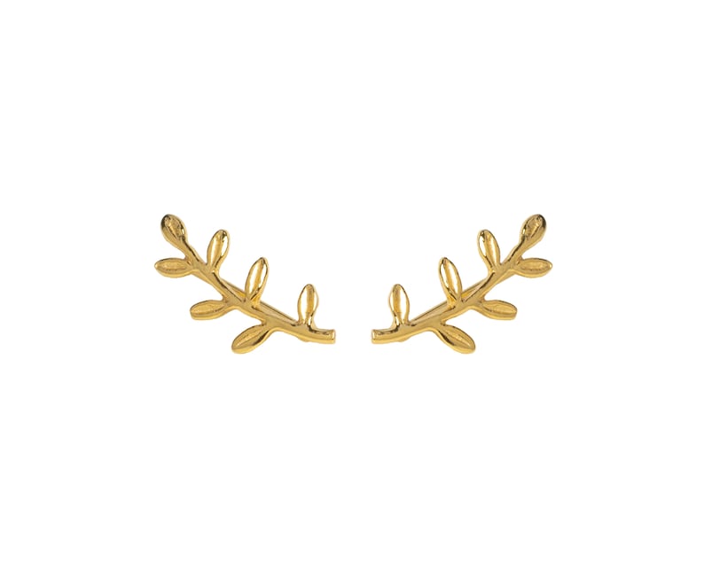 May include: A pair of gold leaf earrings. Each earring features a delicate branch with multiple leaves.