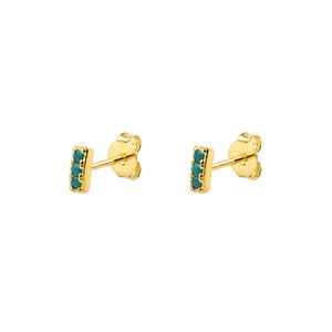 May include: Gold stud earrings with a row of turquoise stones.