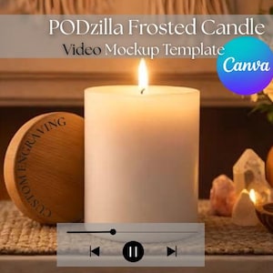 May include: A lit white frosted candle with a wooden lid that says "CUSTOM ENGRAVING". The candle is next to a vase of flowers, crystals, and a small wooden bowl. The image has the text "PODzilla Frosted Candle Video Mockup Template Canva".