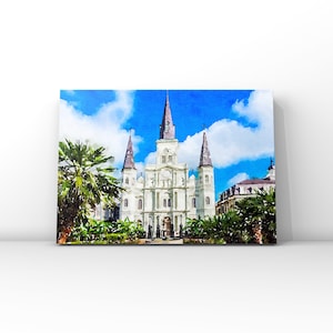 Puede incluir: Pintura a la acuarela de una catedral blanca con tres agujas sobre un cielo azul con nubes esponjosas. Palmeras y otra vegetación enmarcan el edificio. La obra de arte se exhibe sobre un fondo blanco.
