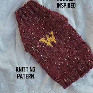 May include: A burgundy knitted sweater with a yellow "W" on the front. The sweater is labeled "WEASLEY INSPIRED" and "KNITTING PATTERN".