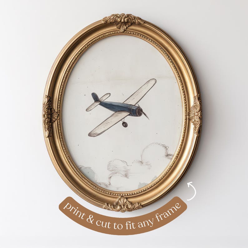 May include: An oval, gold-colored frame surrounds a vintage-style print of a biplane in flight. The biplane is blue and beige, set against a cloudy sky. The text "print & cut to fit any frame" is at the bottom.