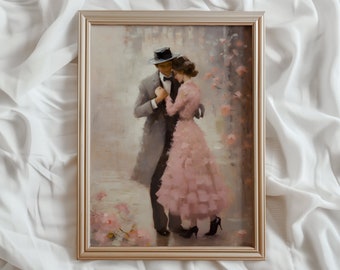 May include: A framed painting of a couple dancing in a romantic setting. The man is wearing a gray suit and a hat, while the woman is wearing a pink dress. The painting is set against a backdrop of flowers and greenery.