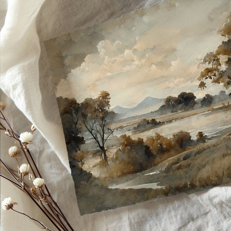 May include: A watercolor painting of a landscape with a river, trees, and mountains in the background. The sky is a light blue with white clouds. The painting is done in shades of brown and gray.