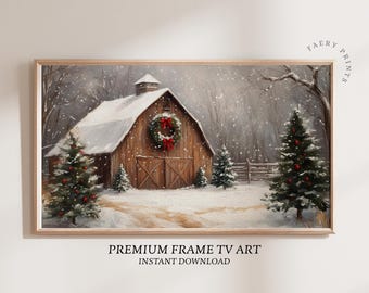 May include: A framed digital art print of a snowy winter scene. A wooden barn with a snow-covered roof and a wreath on the door is the focal point. The print includes the text "PREMIUM FRAME TV ART" and "INSTANT DOWNLOAD".