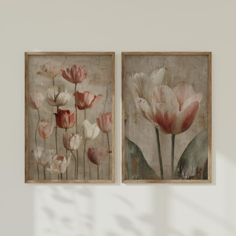 May include: Two framed art prints featuring vintage-style tulip illustrations. The tulips are in shades of pink, red, and white against a textured, neutral background. The frames are a light brown color.