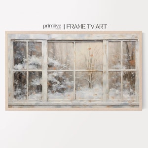 Puede incluir: Una pintura enmarcada de una escena de invierno nevada vista a través de una ventana con múltiples paneles. La ventana está pintada en un estilo rústico con pintura blanca y veta de madera visible. La escena fuera de la ventana es un bosque nevado con árboles y ramas cubiertos de nieve.