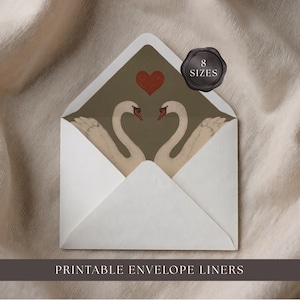 May include: White envelope with a printed interior featuring two swans facing each other, a red heart, and the text "PRINTABLE ENVELOPE LINERS." A black seal with the text "8 SIZES" is on the upper right.
