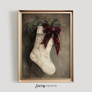 May include: A white stocking with a burgundy bow and green foliage, painted in a vintage style.