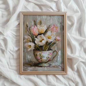 May include: A framed painting of a bouquet of white and pink tulips in a vintage teacup. The tulips are arranged in a vase with a floral pattern. The background is a soft, muted green.
