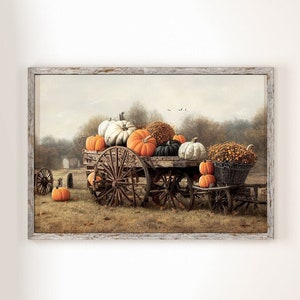 May include: A vintage wooden wagon filled with a variety of pumpkins, including orange, white, and green pumpkins. The wagon is in a field with fall foliage and a rustic wooden fence in the background.