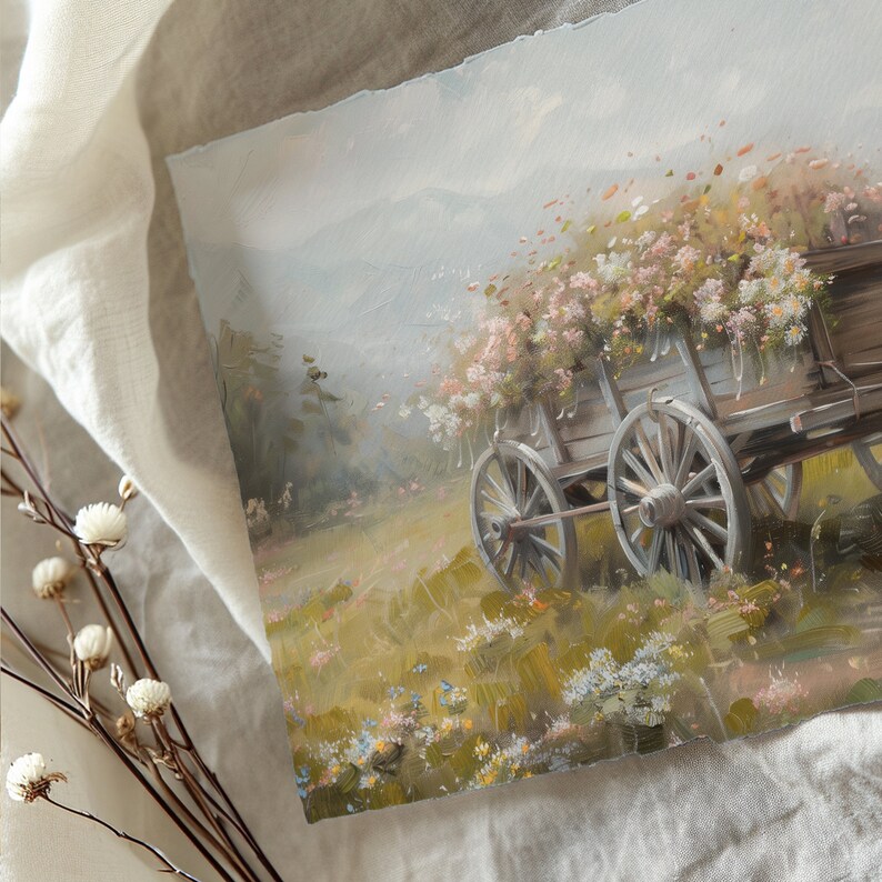 May include: A vintage wooden wagon filled with a bouquet of white and pink flowers. The wagon has two large wheels and is set against a soft, hazy background of rolling hills and a blue sky.
