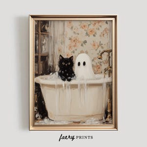 May include: A black cat and a white ghost are having a bath together in a white bathtub with bubbles. The bathtub is in a bathroom with floral wallpaper.