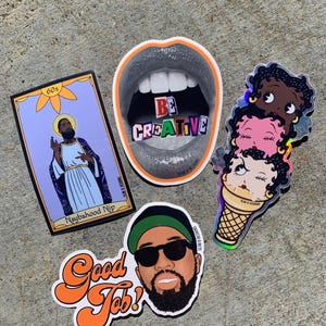 May include: Four colorful stickers with different designs. One sticker features a black and white illustration of a mouth with the word "BE CREATIVE" inside. Another sticker features a black man with a beard and the text "Neighborhood Nip" and "60s". A third sticker features a black and green illustration of a man with a beard wearing sunglasses and a green hat with the text "Good Job!" and a fourth sticker features a holographic illustration of three cartoon women with ice cream cones and the text "Glow & Decisions".