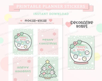 May include: Printable planner stickers with a winter theme. The stickers feature a snow globe with the text "Merry Xmas", a Christmas tree, and a snow globe with the text "Merry Christmas". The stickers are on a pink and green background with white snowflakes.