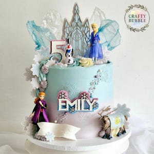 Personalised name/age wooden/acrylic cake toppers or charms pink blue birthday cake snowflake font