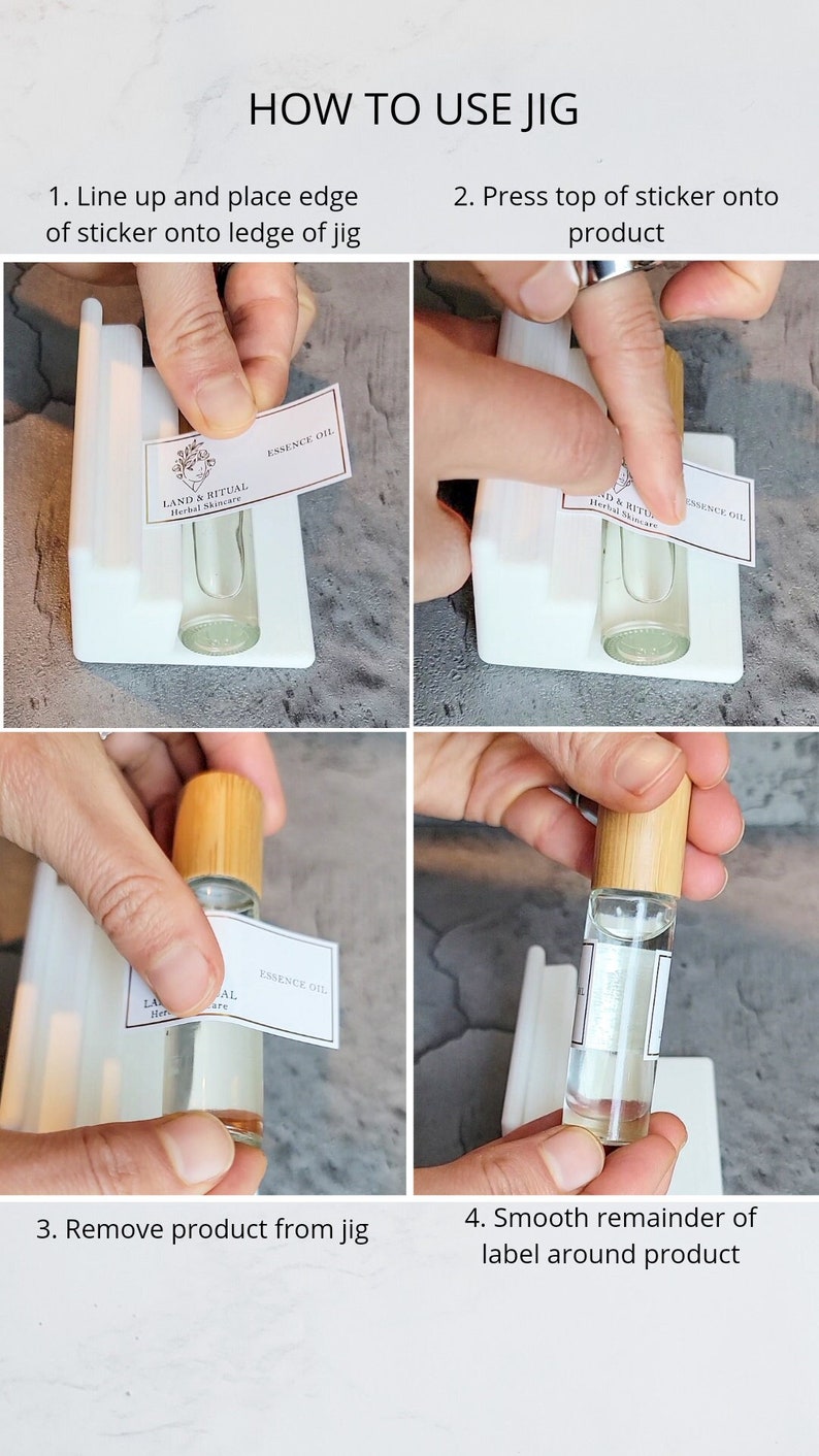 May include: Four images showing how to use a jig to apply a label to a small glass bottle. The first image shows a hand placing the label on the ledge of the jig. The second image shows a hand pressing the label onto the bottle. The third image shows a hand removing the bottle from the jig. The fourth image shows a hand smoothing the label around the bottle.