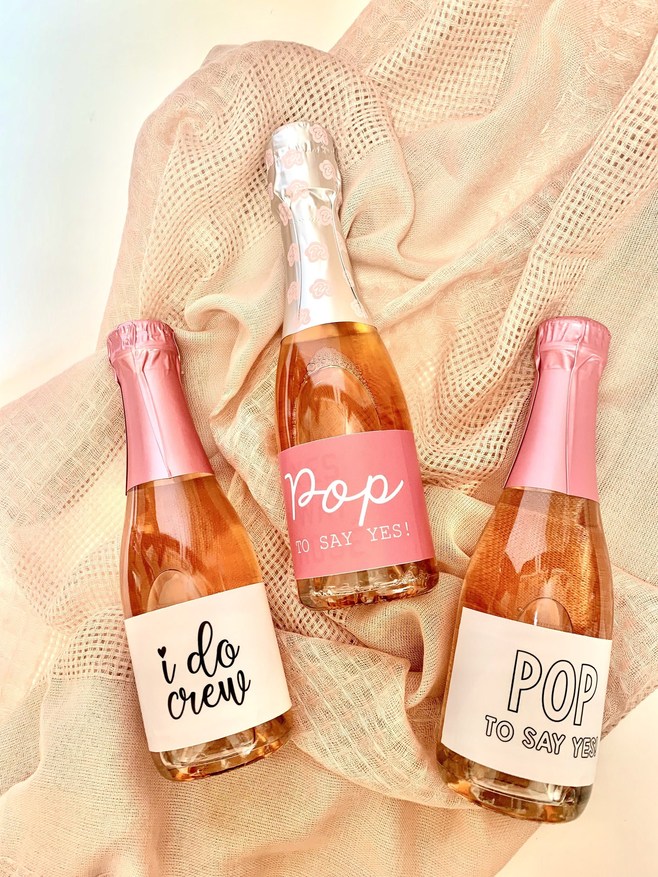 Mini champagne bottles for bridesmaids