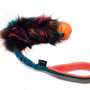 Bungee Dog Tug Toy: Colorful Faux Fur, Rubber Ball, Sheepskin