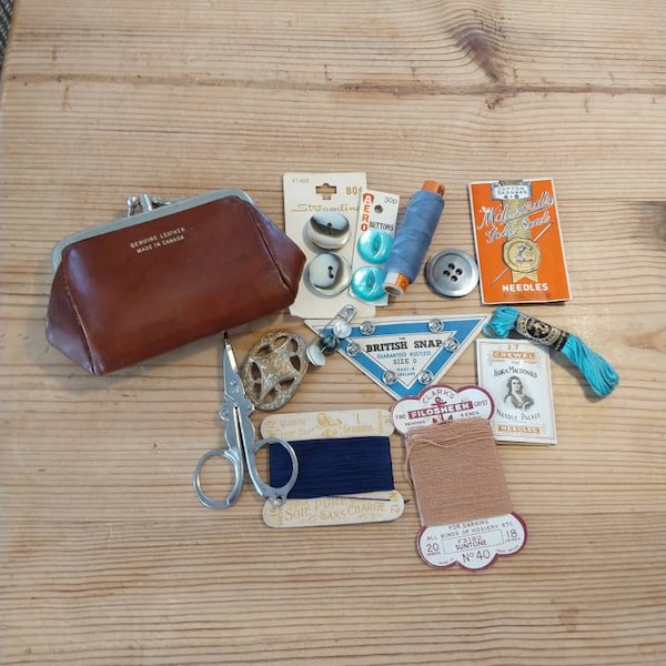 vintage leather purse. Vtg travel mending kit. Flora McDonald needles. MOP buttons. Folding scissors. Vintage French silk thread. Clarks.