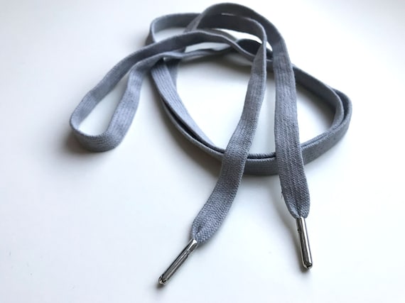 Grey draw cord strap with silver tab(ETC)