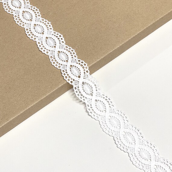 Off White poly lace trim 1 1/8" - Selling per yard (LT7)