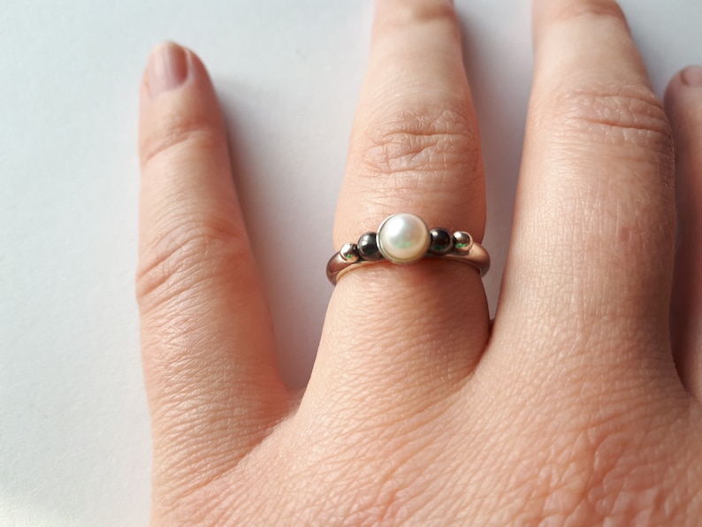 Silver handmade unique ring with pearl.