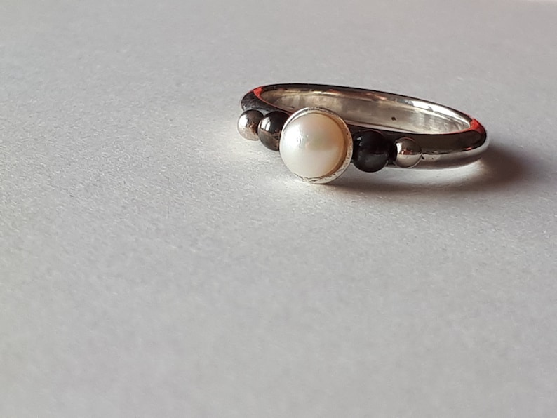Silver handmade unique ring with pearl.