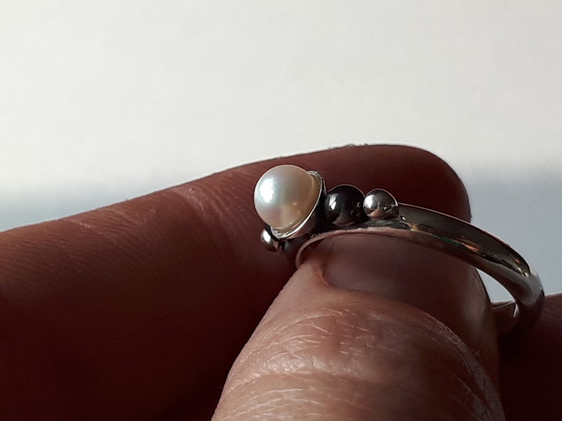 Silver handmade unique ring with pearl.
