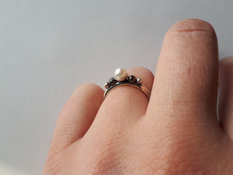 Silver handmade unique ring with pearl.