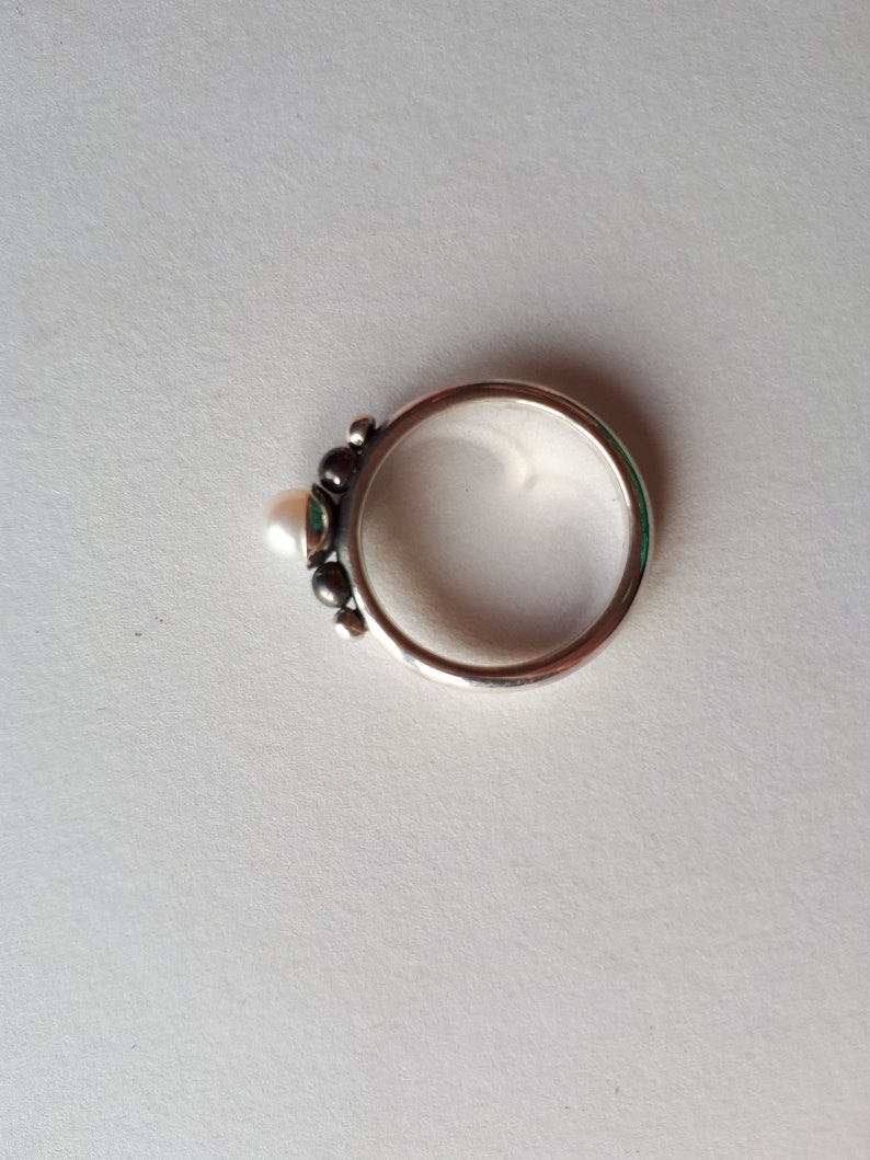 Silver handmade unique ring with pearl.