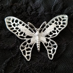 Silvertone butterfly brooch by Sarah Coventry, 1970's