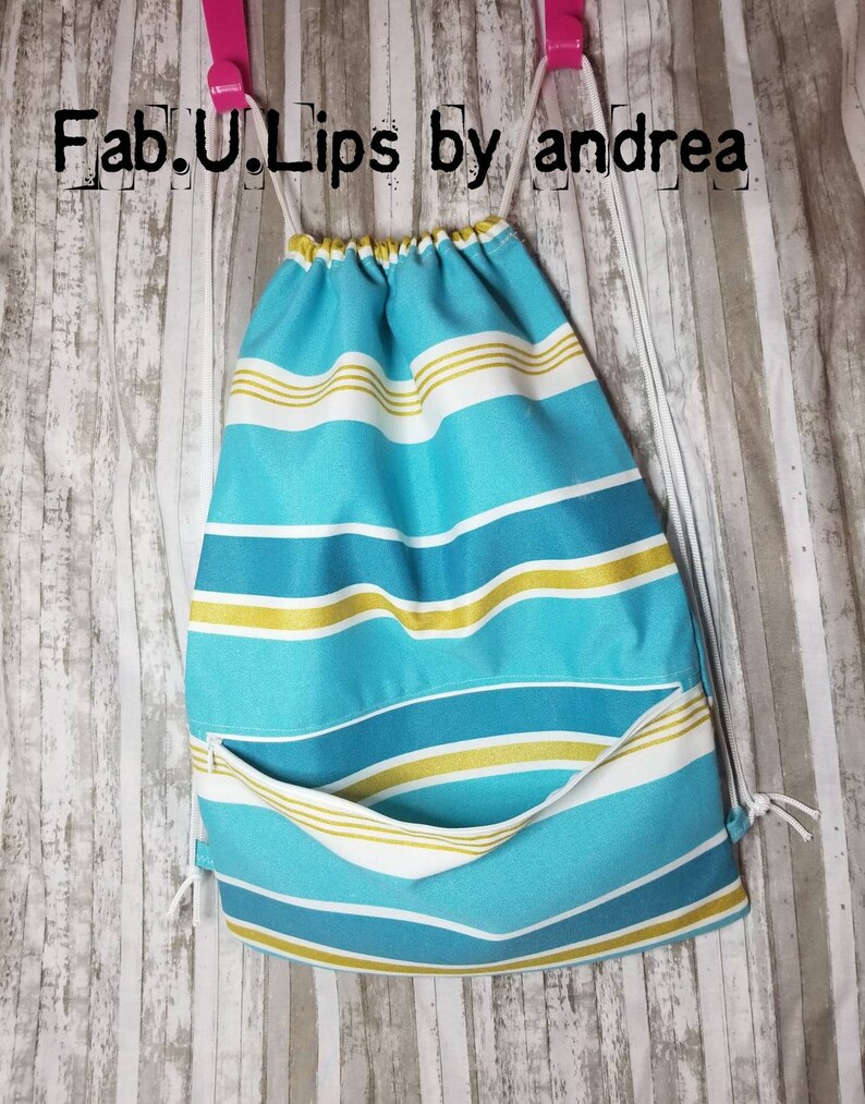 Stripe drawstring backpack 19x 13.5 front pocket with 12 inch zipper