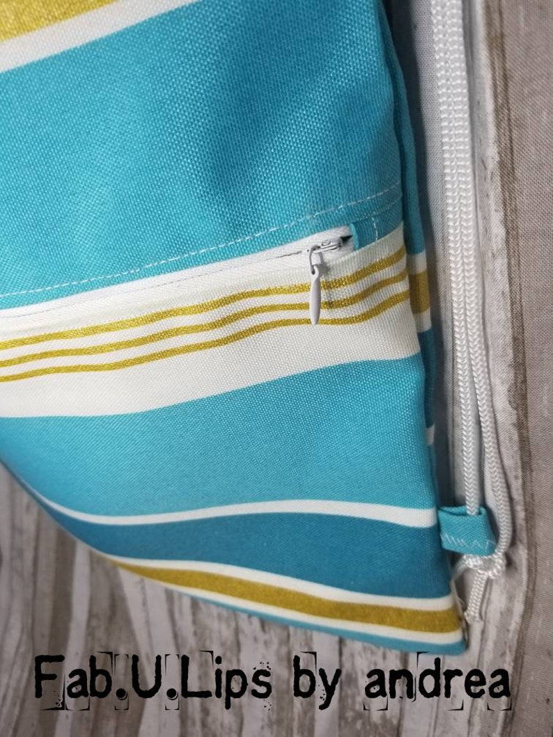 Stripe drawstring backpack 19x 13.5 front pocket with 12 inch zipper