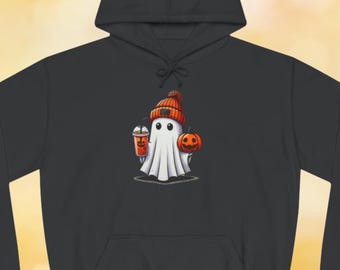 May include: A black hoodie with a white ghost wearing an orange and black beanie holding a pumpkin and a cup of orange liquid.