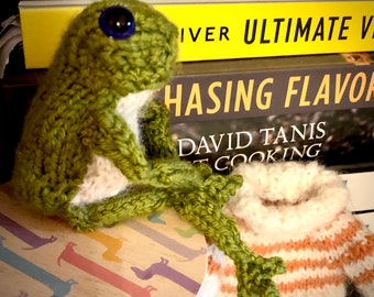 little knitted frog in a sweater , lots of colour choices