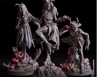 May include: Three gray Deep Hags figurines with a 25 mm base. The figures are in dynamic poses, with one in the center appearing to dance. The figures have horns, tattered clothing, and skeletal features. The base is covered in skulls and bones.