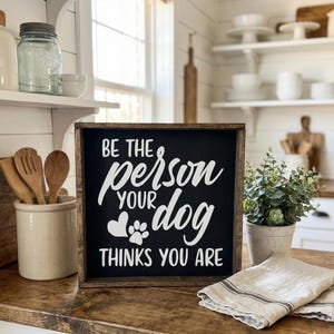 Be the Person Your Dog Thinks You Are Sign | Funny Dog Lover Gift | Rustic Farmhouse Pet Decor | Dog Mom Gift | Wood Paw Print Wall Art