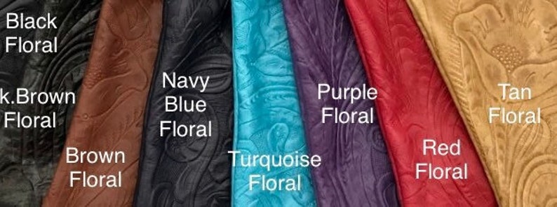 May include: A selection of eight leather swatches with embossed floral patterns in various colors, including black, brown, navy blue, turquoise, purple, red, and tan.