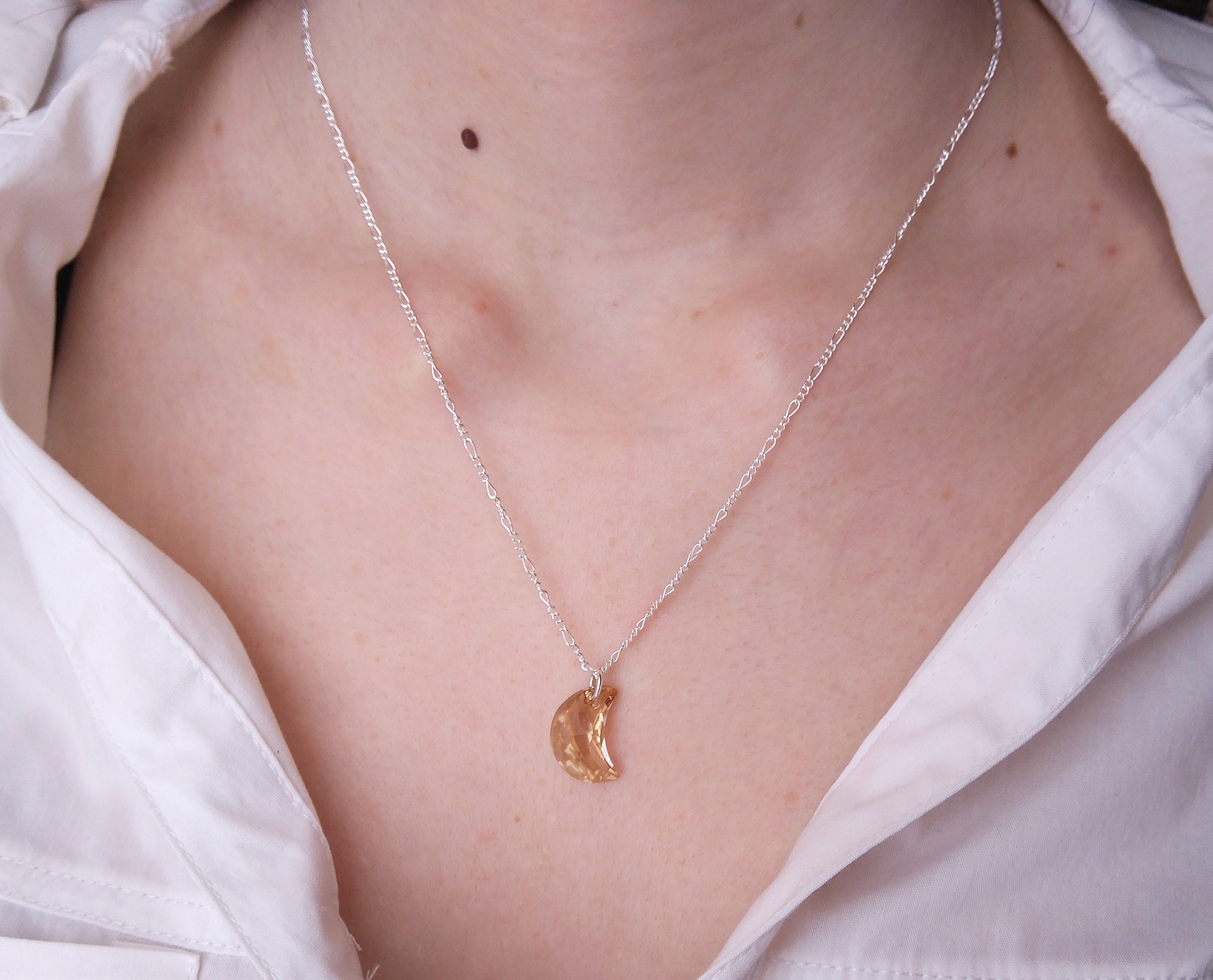 Swarovski Symbolic necklace, Moon, infinity, hand, evil eye and horseshoe,  Blue, Rose gold-tone plated