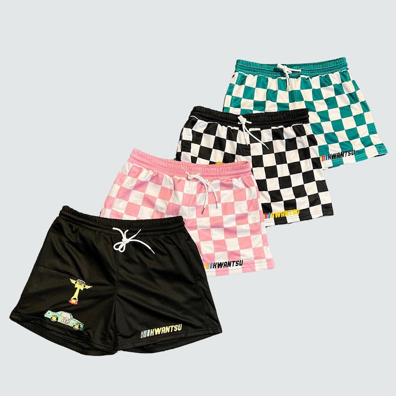 May include: Four pairs of checkered shorts in black and white, pink and white, green and white, and black. Each pair has a drawstring and the text "#KWANTSU" printed on the bottom.