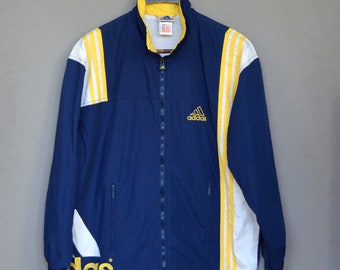 blue and yellow adidas tracksuit womens