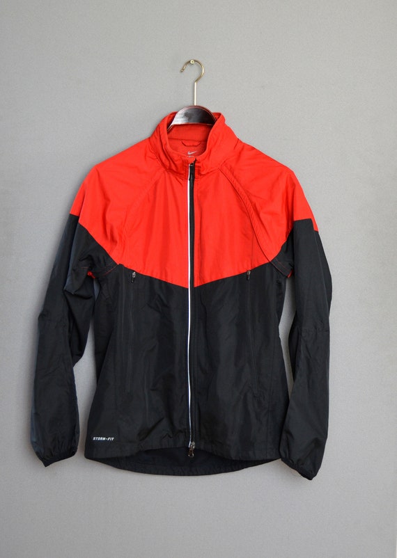 nike tracksuit black and red