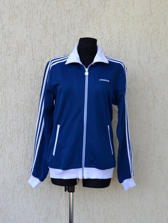 blue and white adidas suit